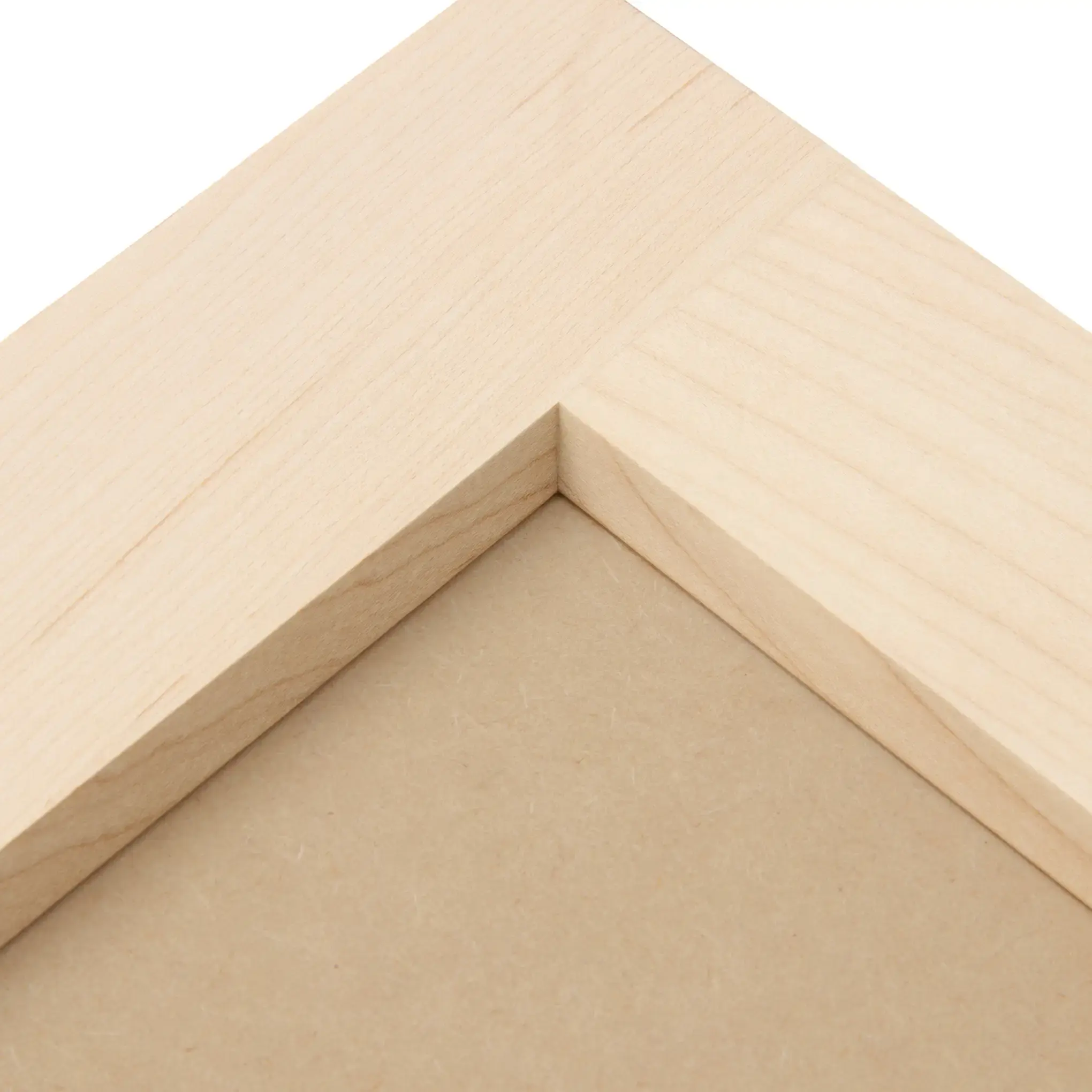 Beveled inner-edge profile at the corner of an unfinished door frame